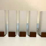 Many Louis Kallf wall lights.