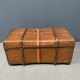 Antique brown travel case with wooden slides from the early 1900s