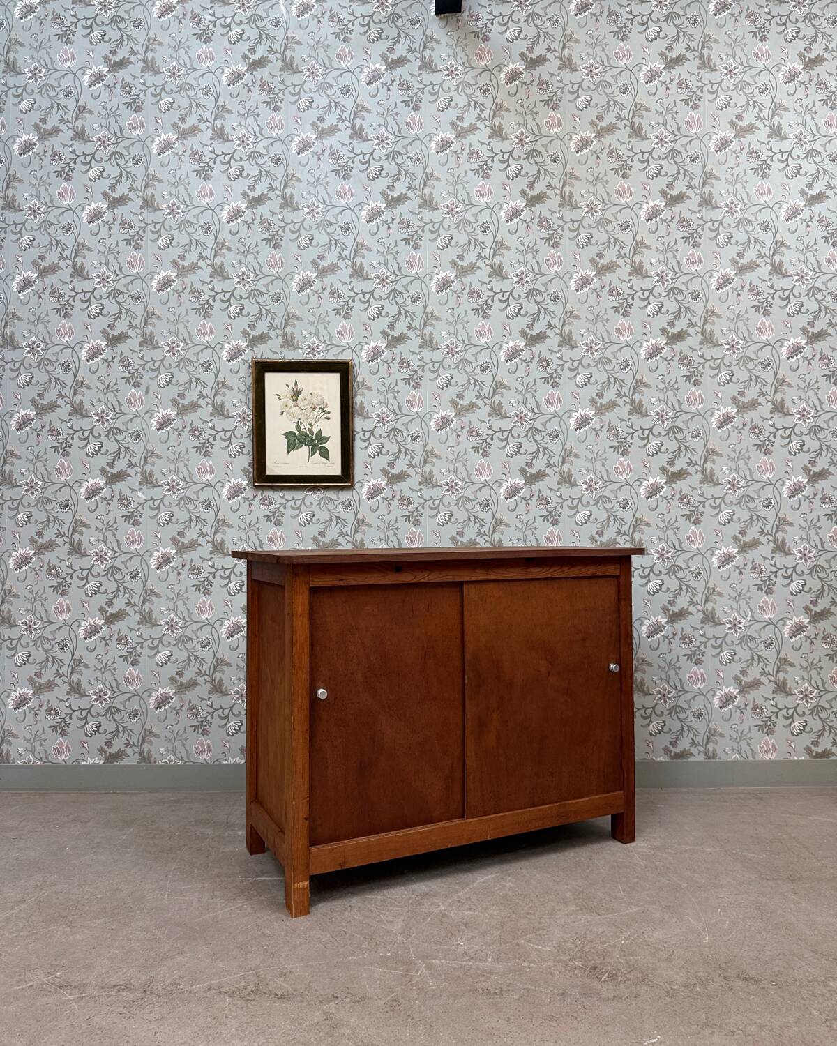 Vintage sideboard with sliding doors