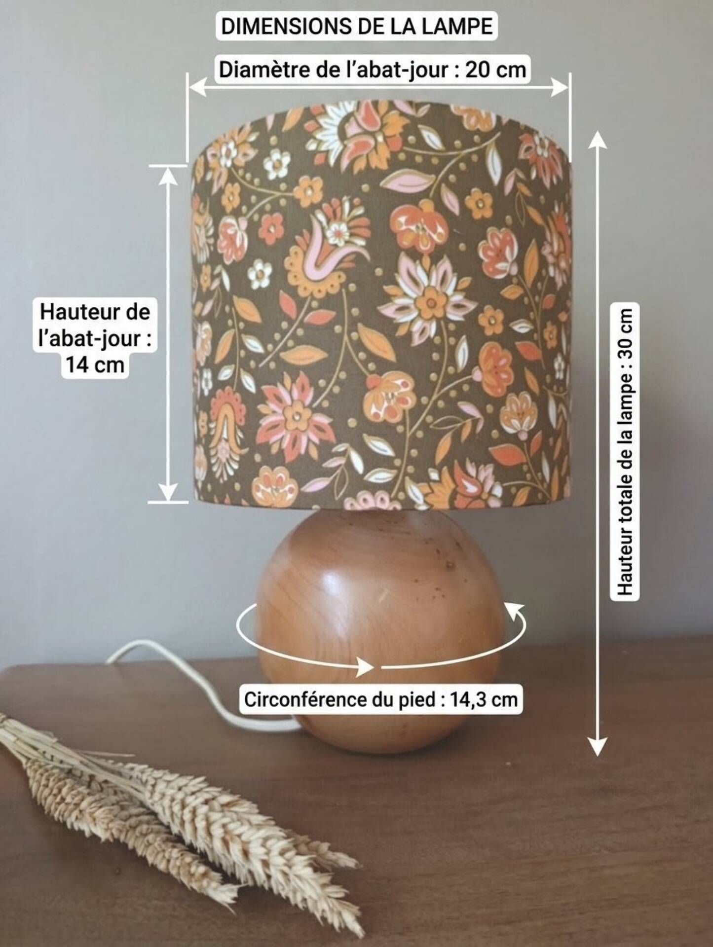 Table lamp with a wooden ball base, floral print in bohemian style.
