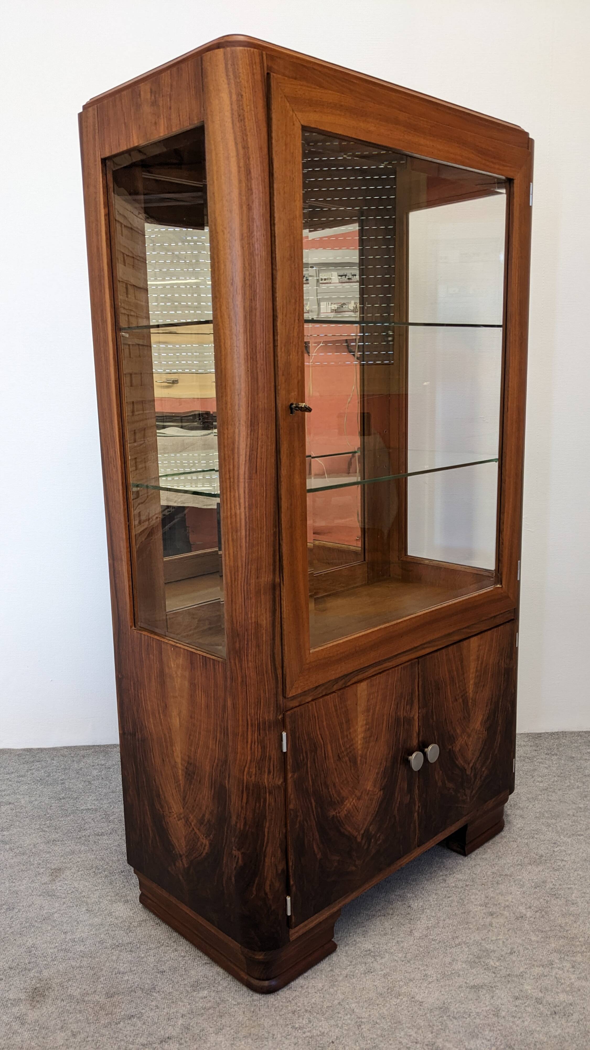 Art Deco walnut burl display cabinet, France circa 1930.