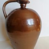 Ancient enamelled sandstone jug