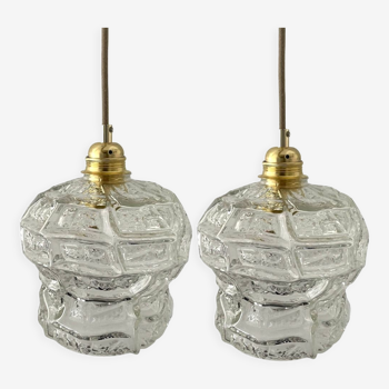 Set of two carved glass pendant lamps