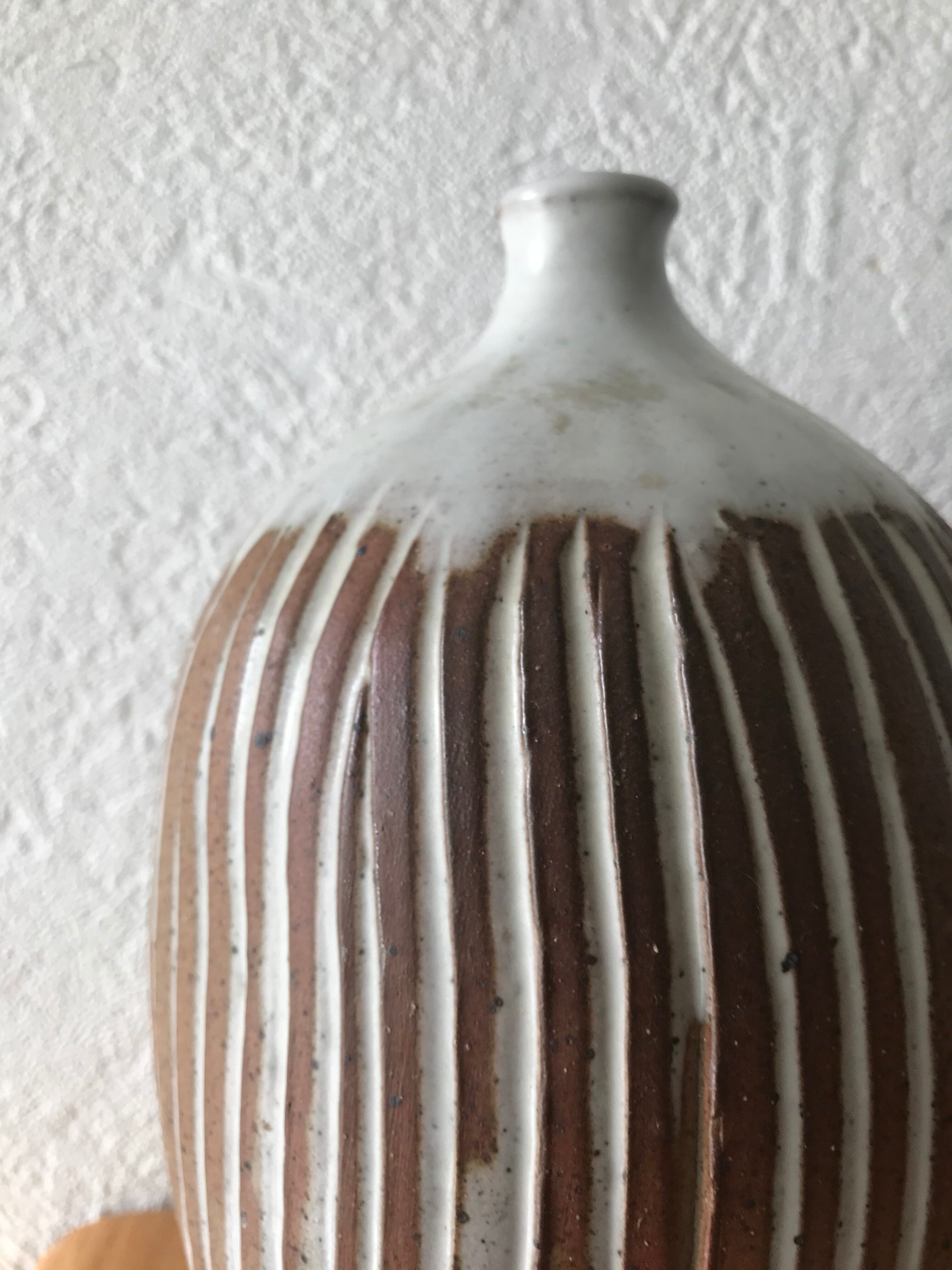 Large enamelled sandstone vase