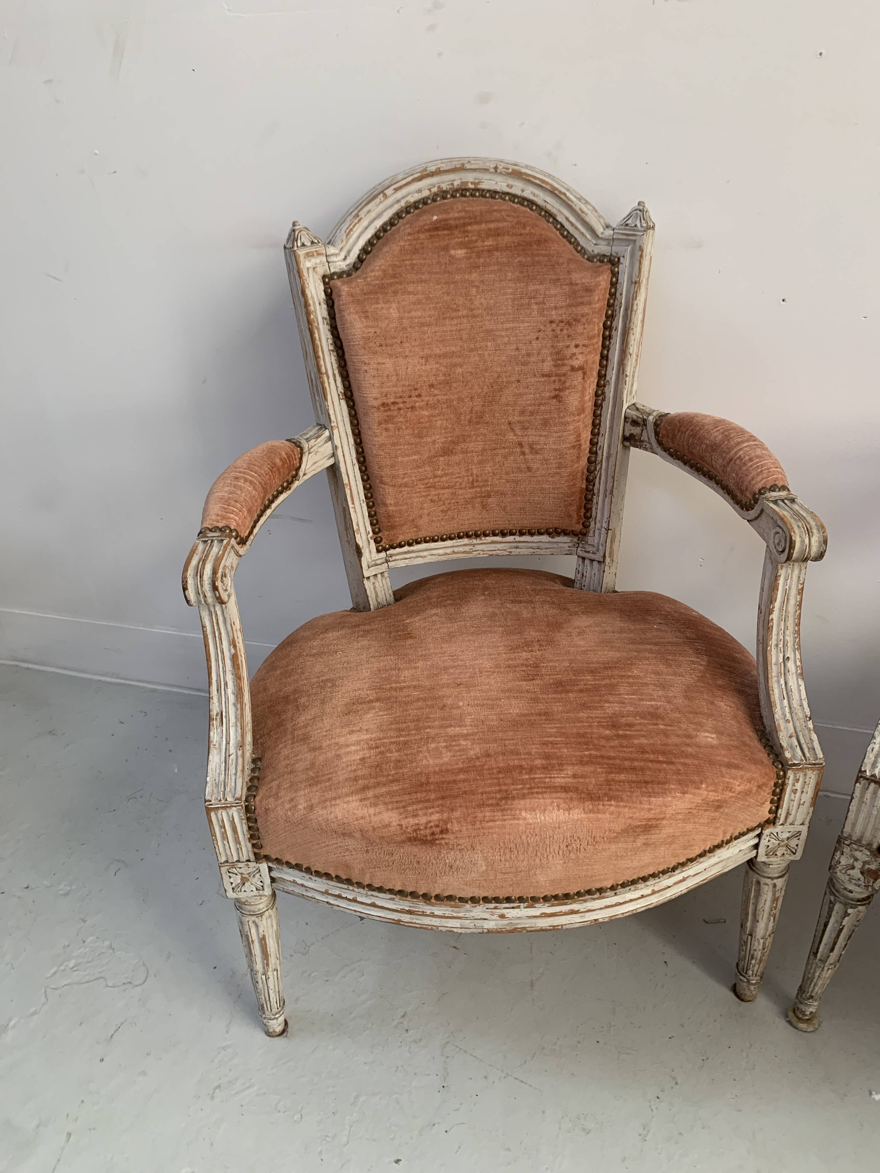 Pair of Louis XVI style armchairs in patinated beech, 19th century