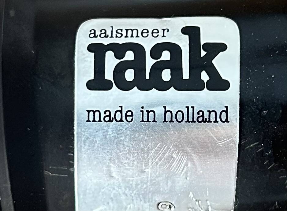 Pair of vintage Raak opaline and Bakelite wall lights, Netherlands 1970s