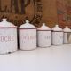Series of 6 spice pots in white and red enamel for cooking