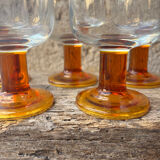 Luminarc footed glasses from the 1970s in orange.