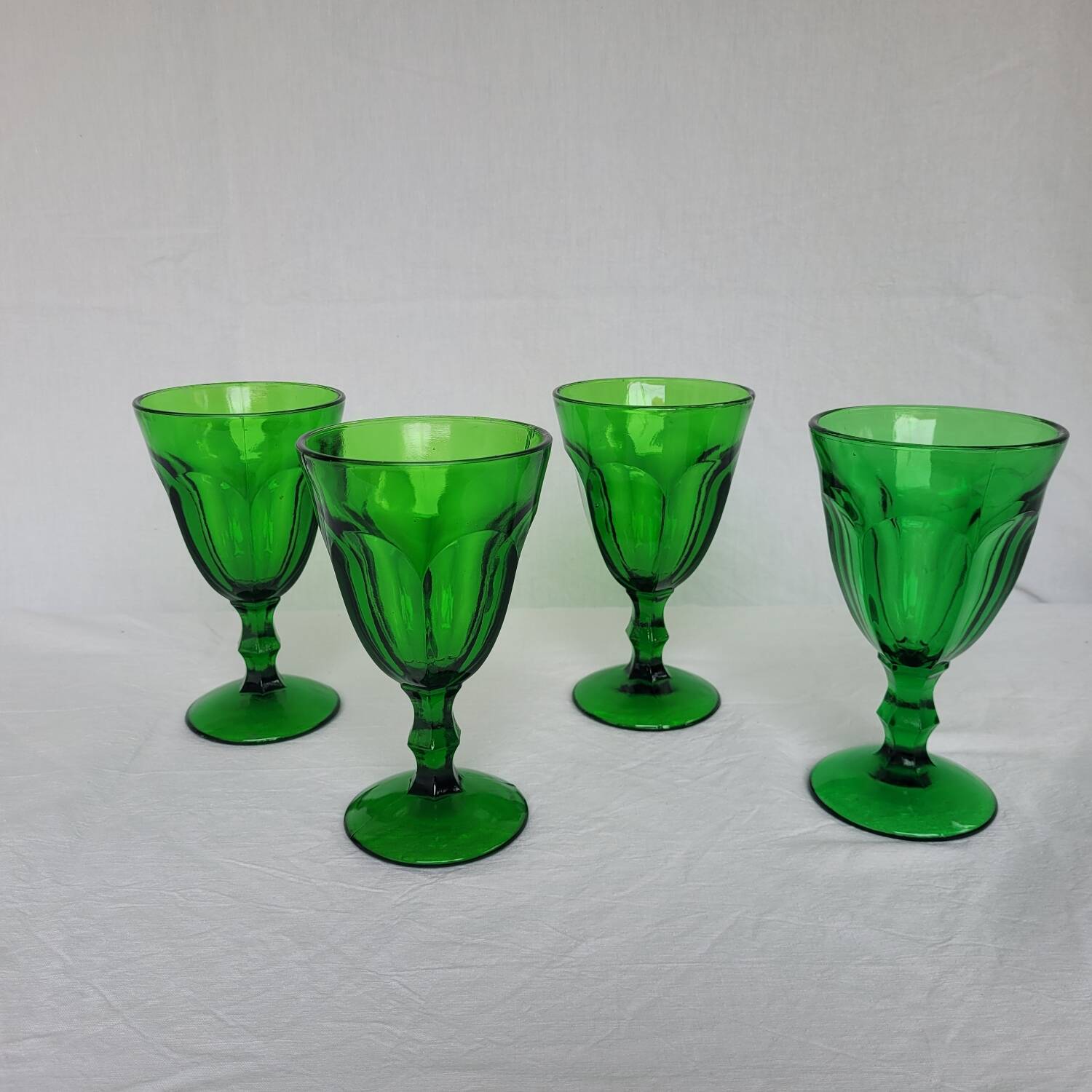 4 green footed glasses in moulded glass – 1970s