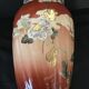 Vase - enamelled faïence with hand-painted gilding
