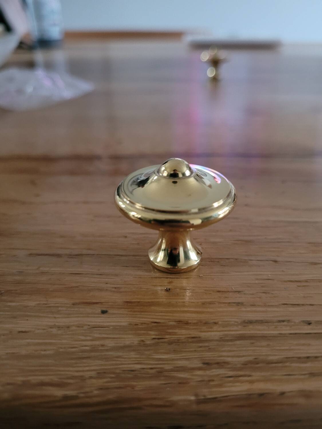 Polished brass furniture knobs