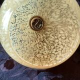 Art deco sconce, golden brass and yellow speckled Clichy glass globe