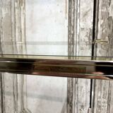 Plexiglass shelf by Pierre Vandel in Hollywood Regency style circa 1970.
