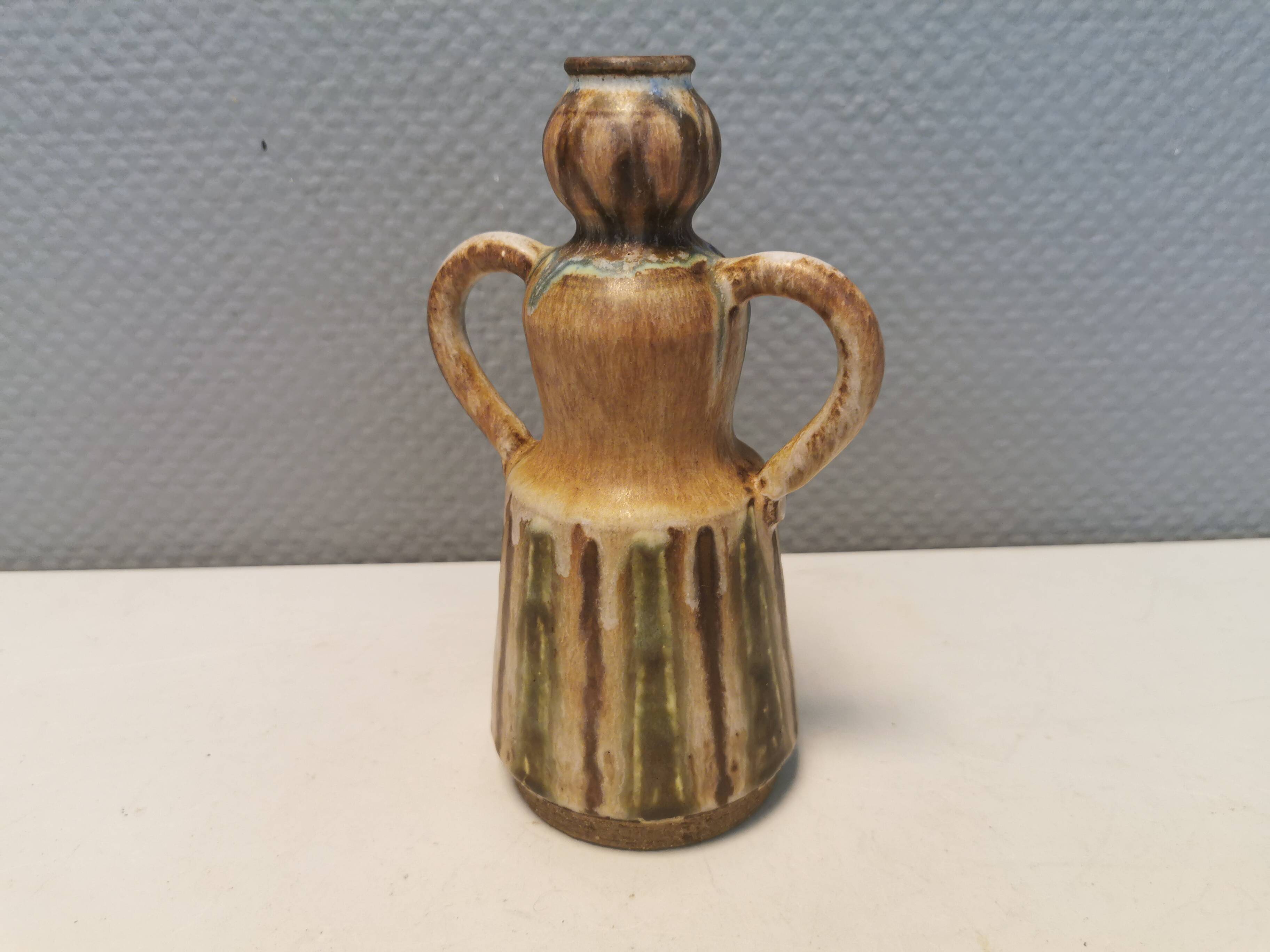 Beautiful ceramic vase in the shape of a lady, in multicolored glaze. Denmark 1970-80s