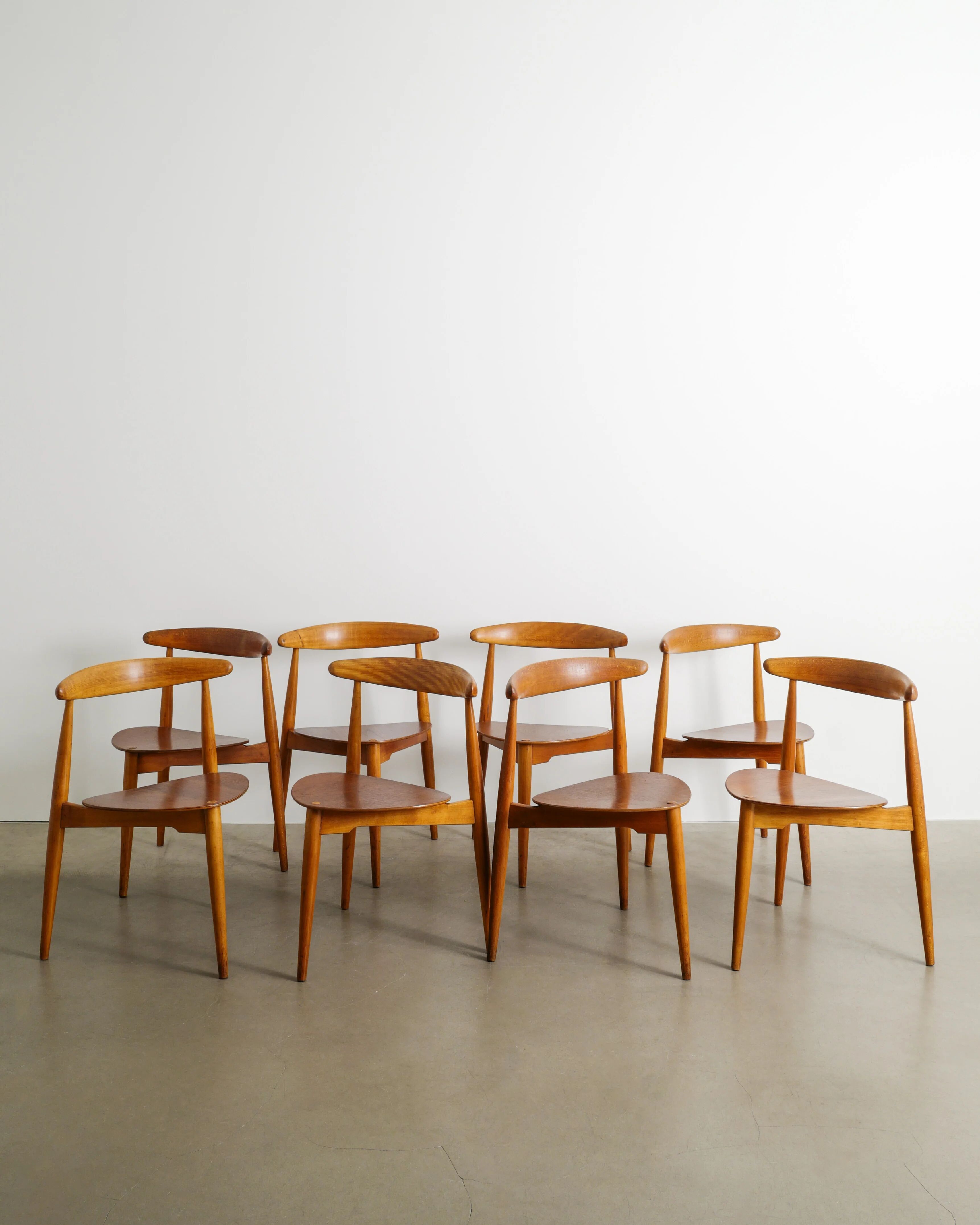 EIGHT WOODEN HANS J WEGNER "HEART / 4103" DINING CHAIRS, 1950s