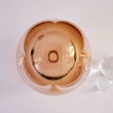 A pair of submerged glassware from the 1940s.