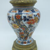Bayeux/Imari vase mounted in porcelain with bronze frame