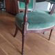 pair of Directoire armchairs in walnut, early 19th century, green velvet