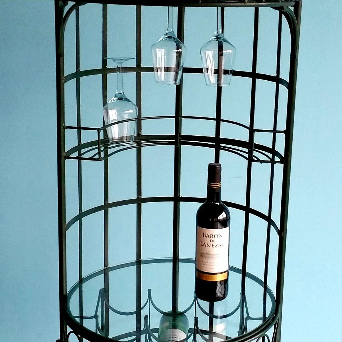 Wrought iron bar with bottles holder