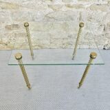 End of sofa, glass and twisted legs in gilded metal