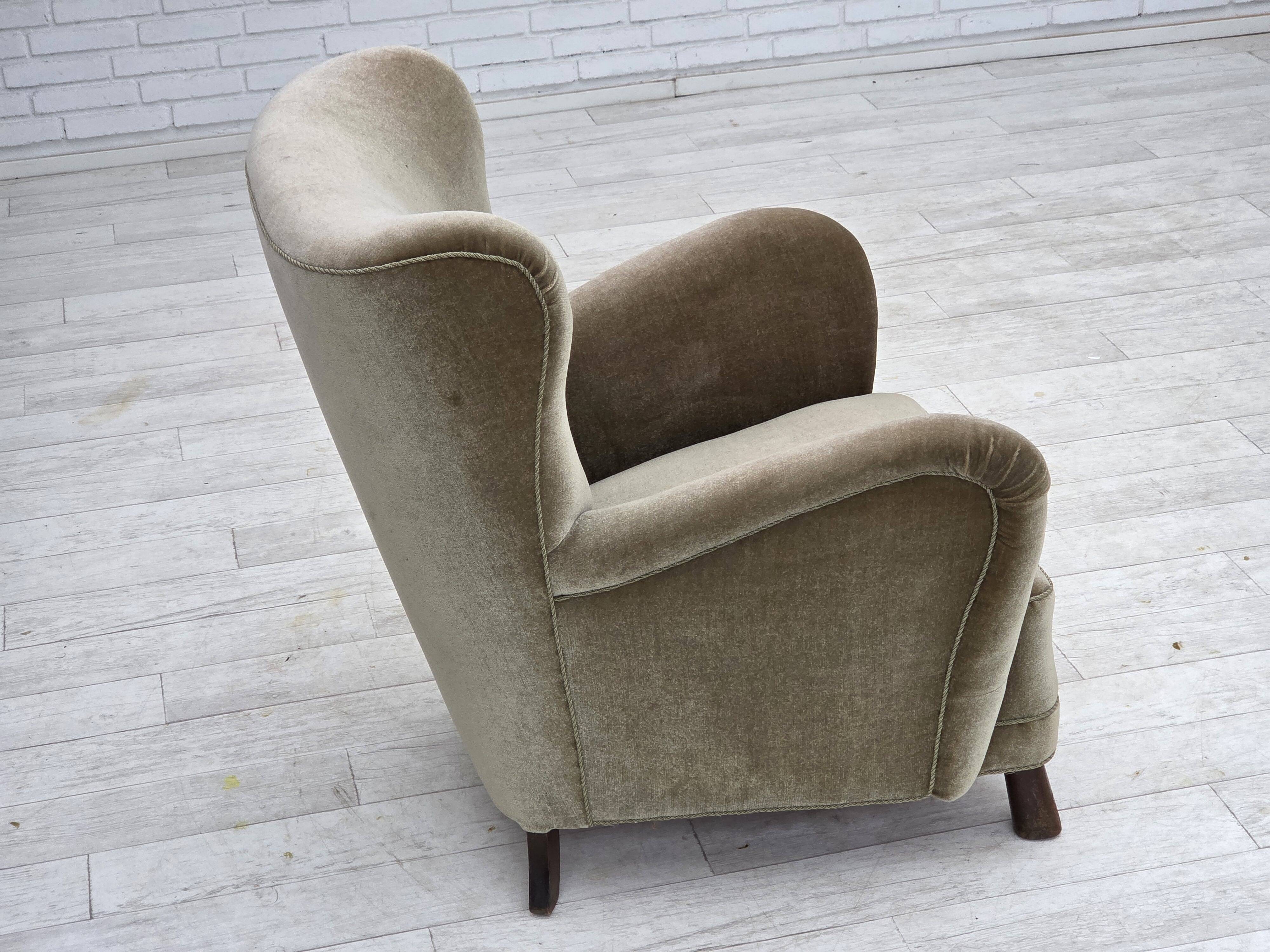 1960s, Danish armchair, green furniture velour, oak wood legs.