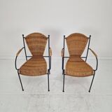 Pair of wicker and iron armchairs by Frederic Weinberg, United States, 1950s.