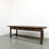Authentic French farmhouse table from 1890 in solid oak with two drawers.