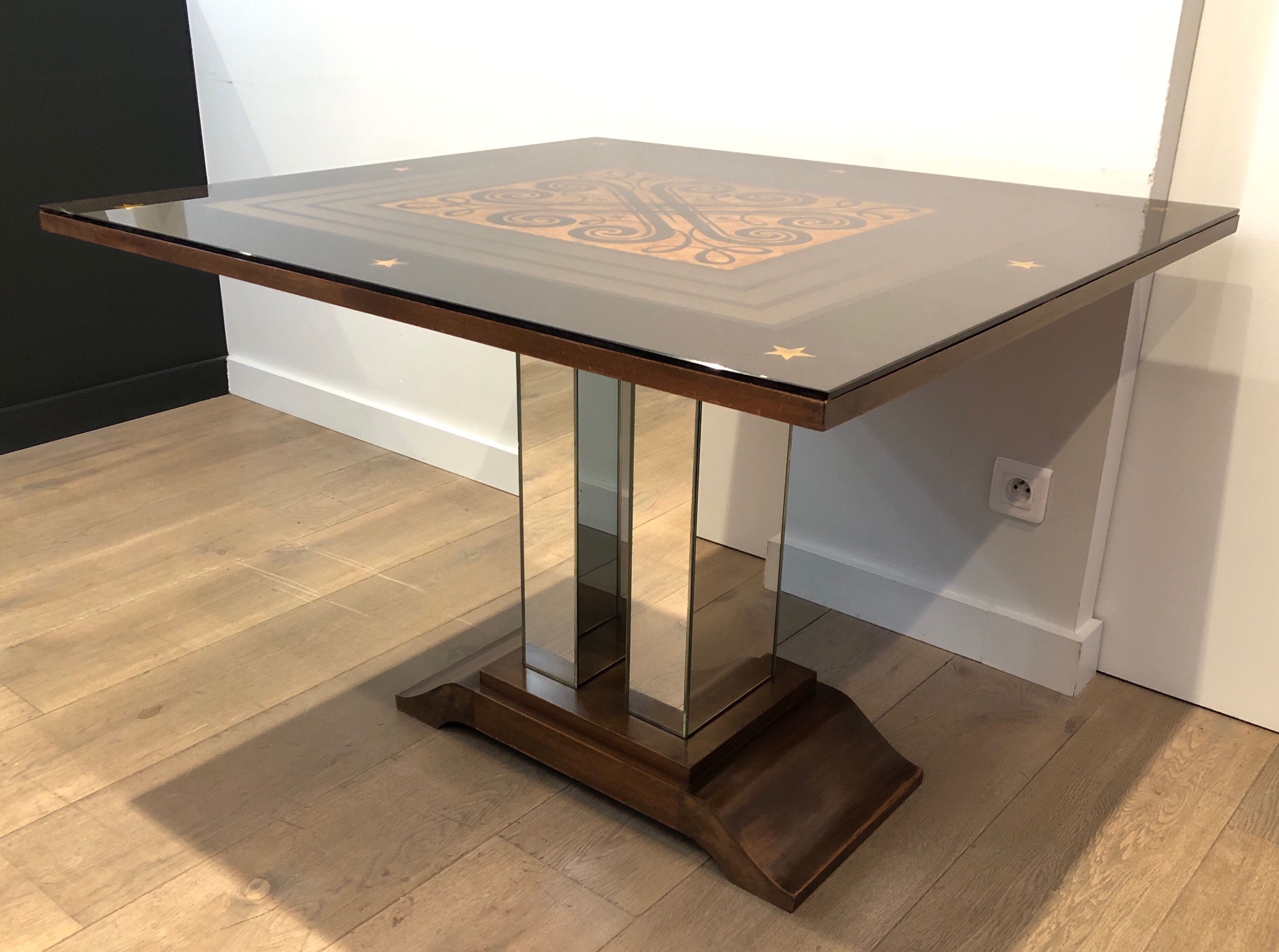 Art Deco centre table with a mirrored eglomisé top in the style of Jules Leleu and Max Ingrand.