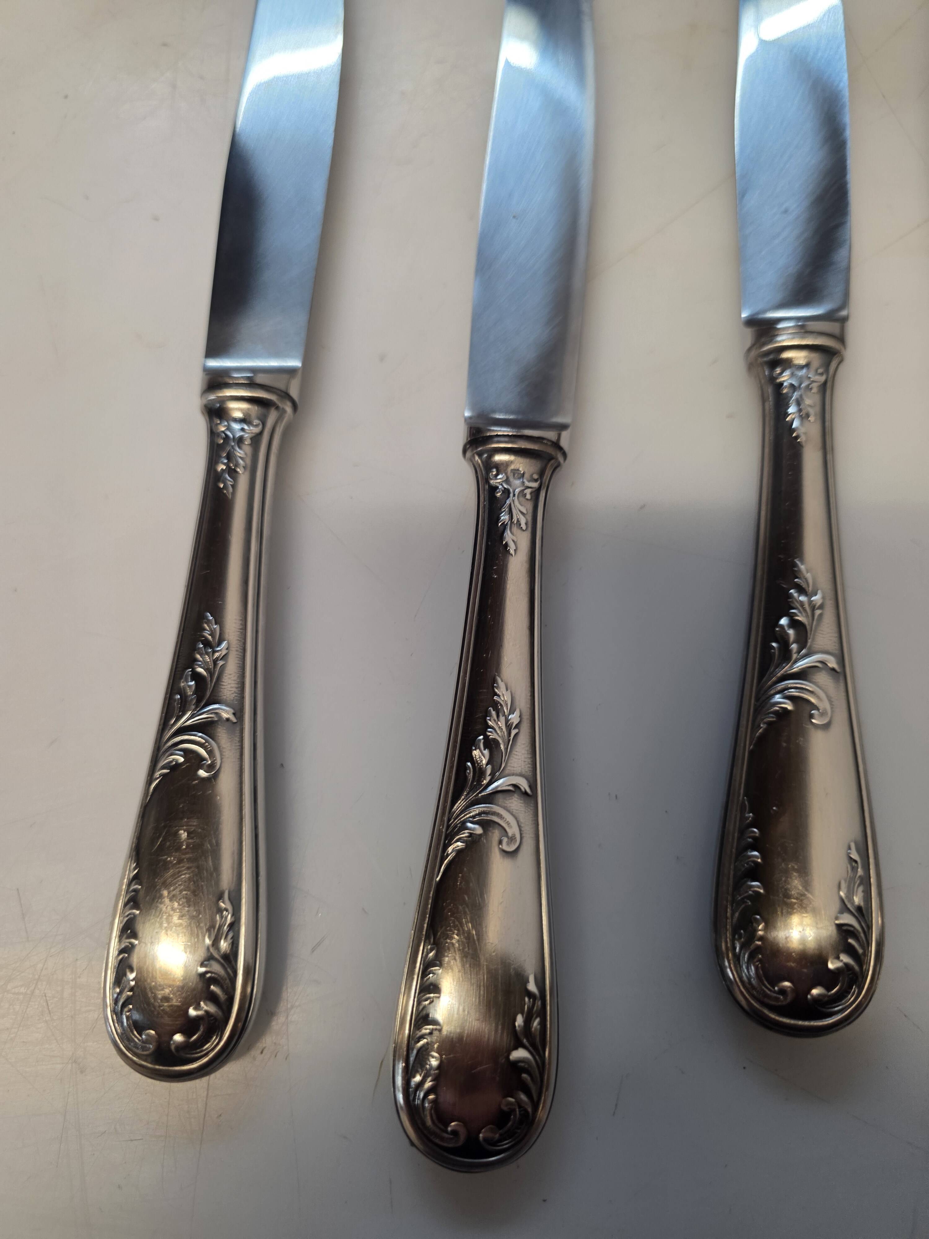 12 silver-plated knives