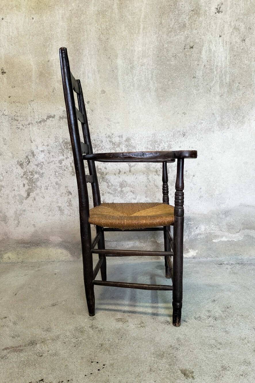 High back straw armchair