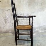 High back straw armchair