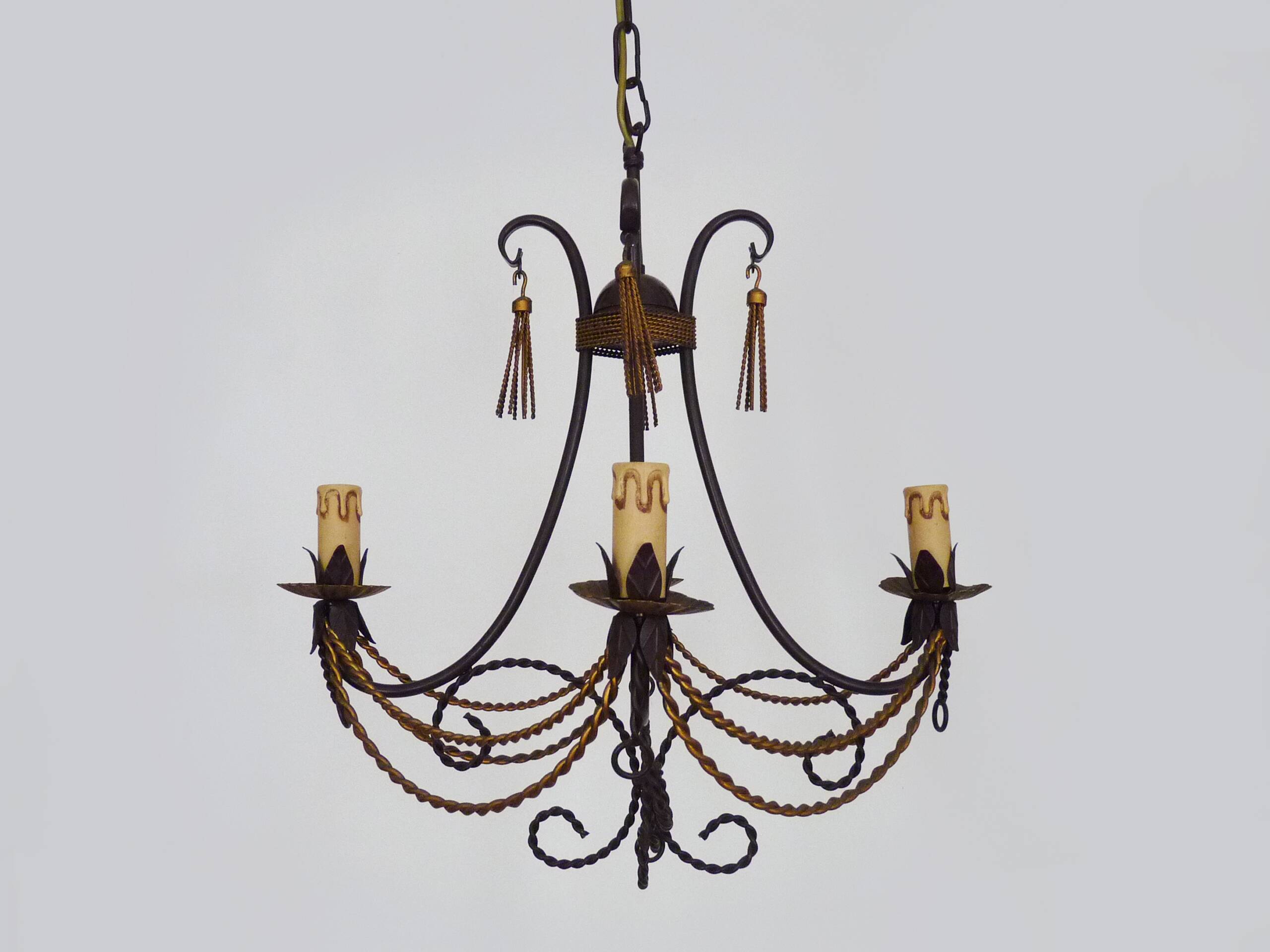 Vintage 4-arm, 4-light chandelier from the 1980s. Brown and gold metal.