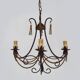 Vintage 4-arm, 4-light chandelier from the 1980s. Brown and gold metal.
