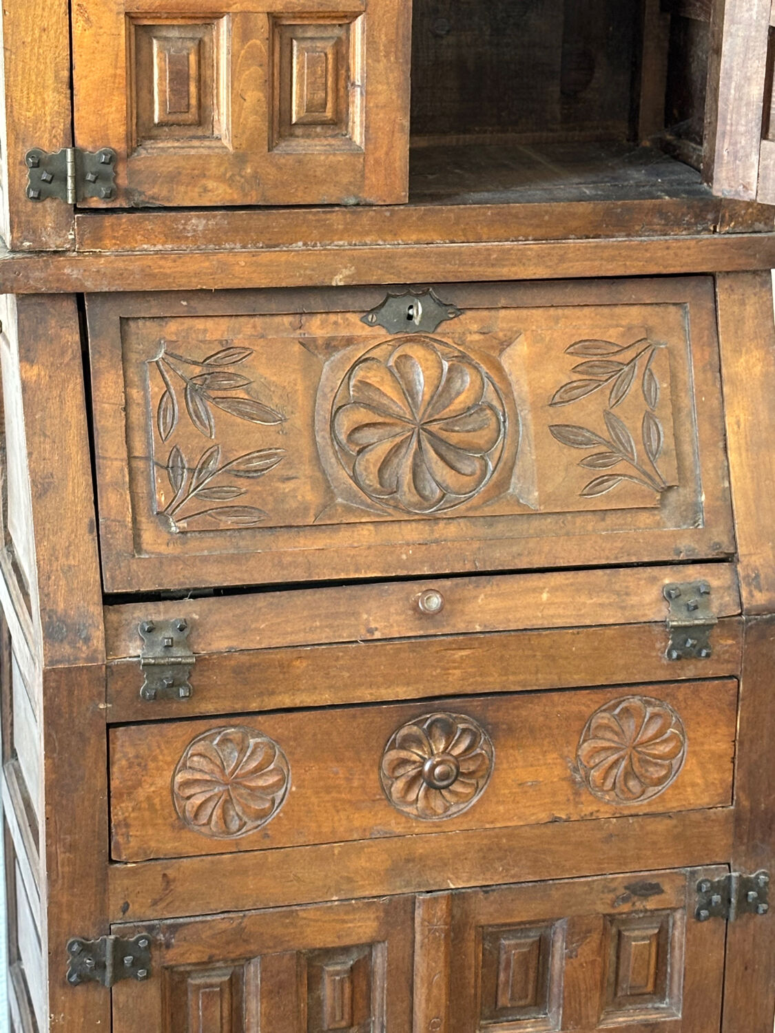 Antique Spanish wardrobe with three sections — carved drop front & wrought iron