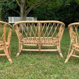 Set of children's rattan garden furniture from the 1950s and 1960s, including chairs, table, and bench.