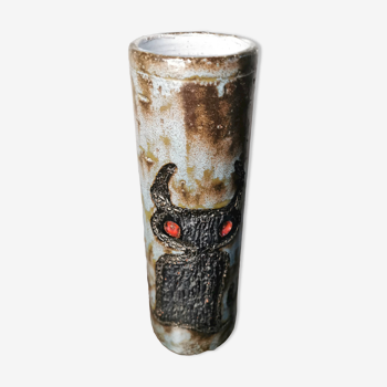 Vintage ceramic vase decorated with chiseled owls