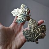 2 golden leaf curtain clips