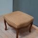 Pouf upholstered legs cambered in mahogany