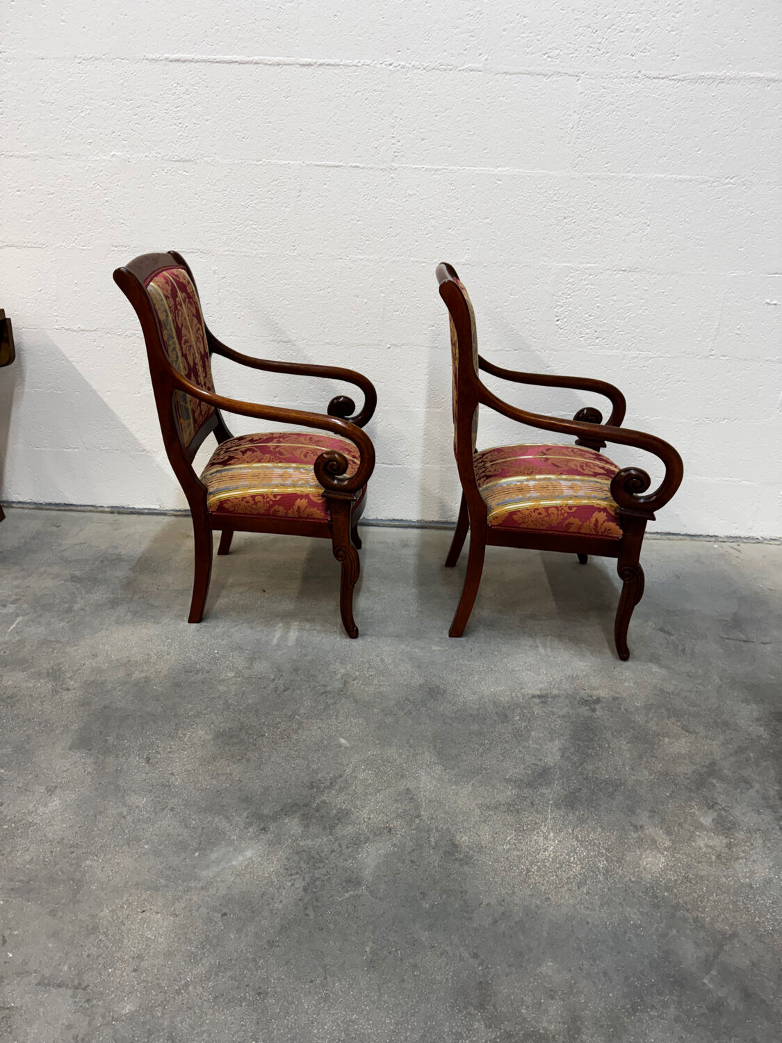Pair of cross-back armchairs, Empire style, 19th century.