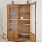 Oak glass-fronted school cabinet 1960