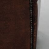 Set of two characterful sheepskin armchairs with a beautiful deep colour