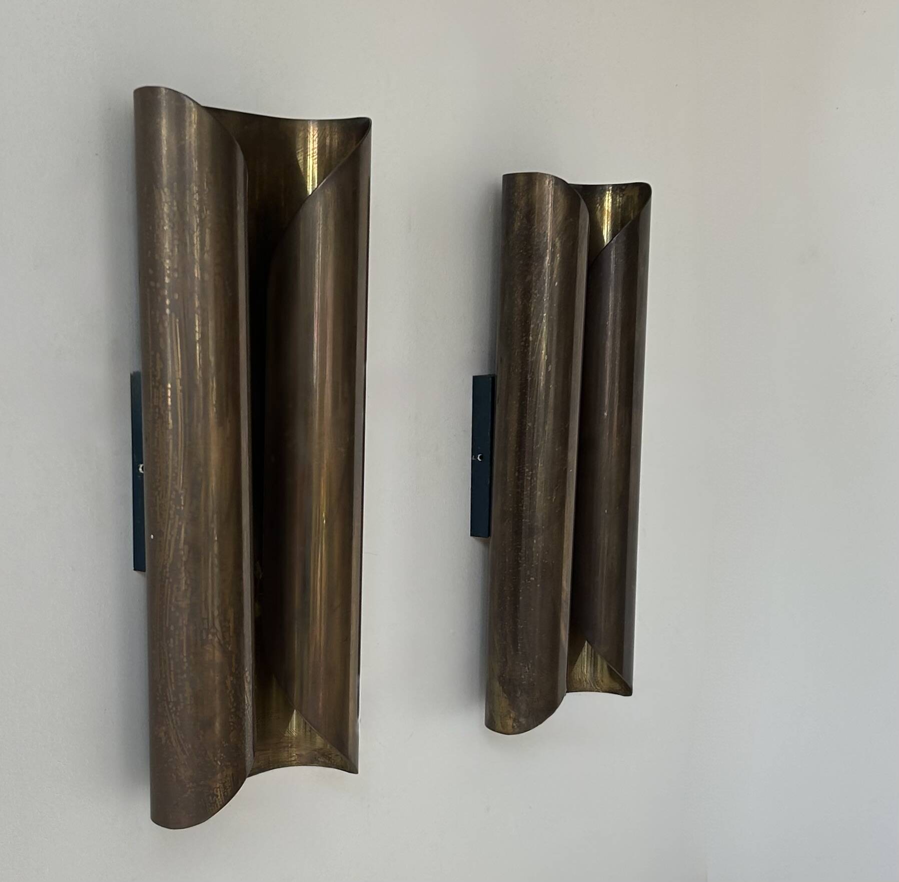 Pair of vintage wall lights in patinated brass, France 1970