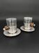 Duo of hammered metal and blown glass cups — handcrafted work