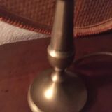 Table lamp at the foot candlestick