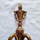 French Empire-style wall sconce or chandelier in bronze with an antique gold patina.