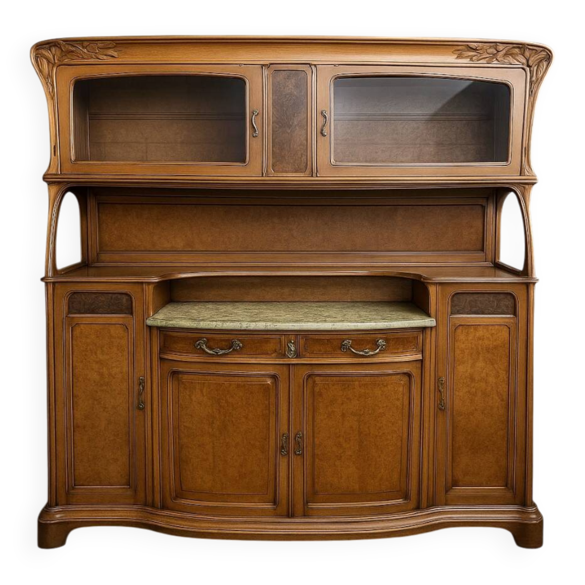 According to Gauthier-Poinsignon: large two-body buffet from the Art Nouveau period in walnut and burl.