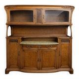 According to Gauthier-Poinsignon: large two-body buffet from the Art Nouveau period in walnut and burl.