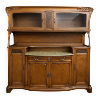 According to Gauthier-Poinsignon: large two-body buffet from the Art Nouveau period in walnut and burl.