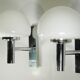 Pair of chrome and glass wall lights from the 1970s.