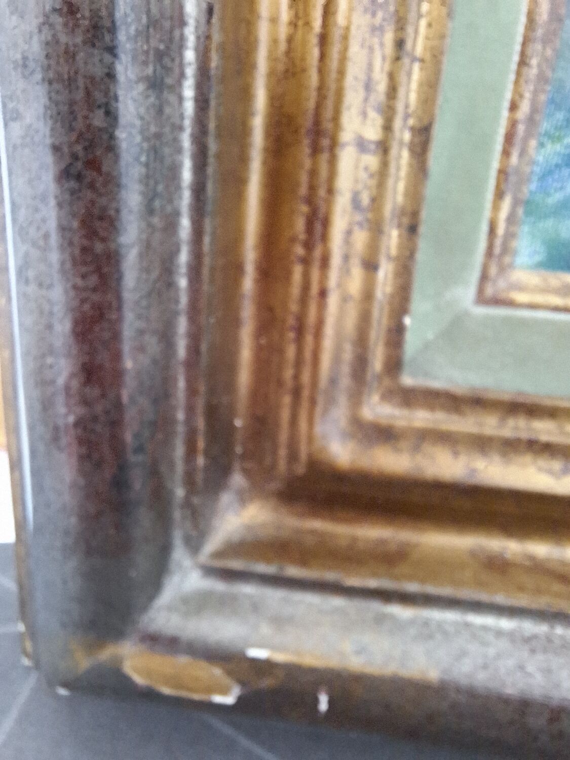 Oil painting depicting the Quai de Seine and booksellers.